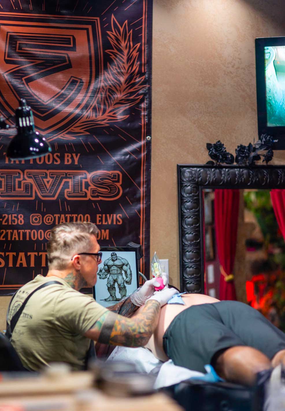 Jason ‘Elvis’ Martin tattooing a client in his private Hendersonville, TN studio