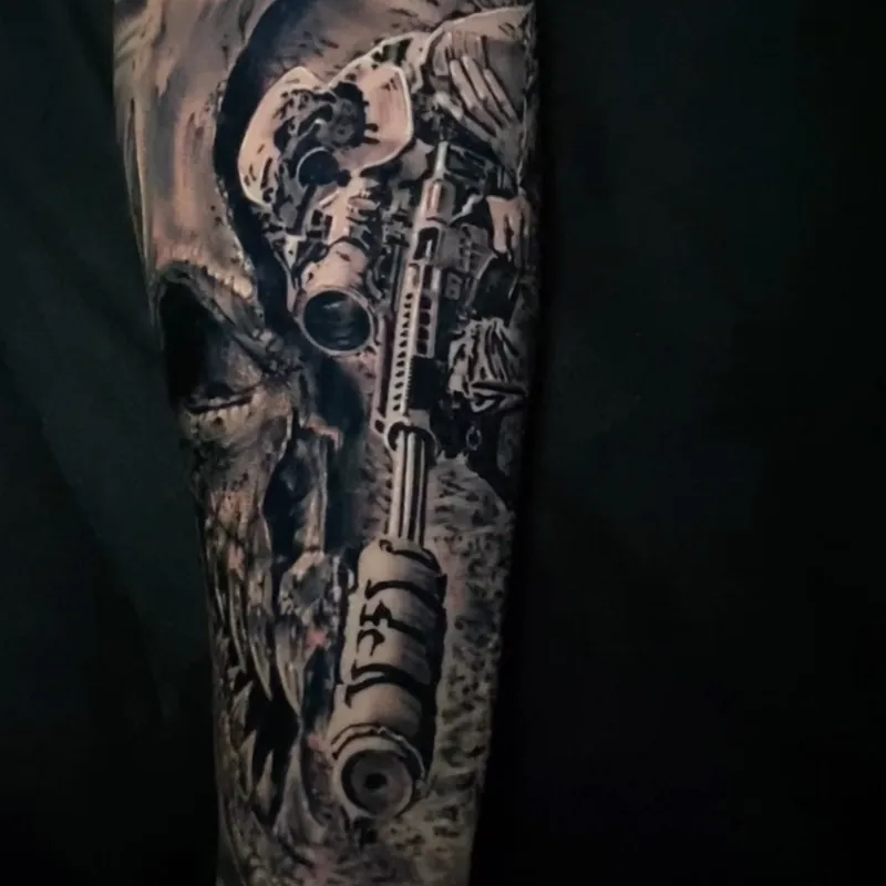Black and grey realism tattoo of a sniper rifle fitted with a scope and suppressor, layered over a skull design.